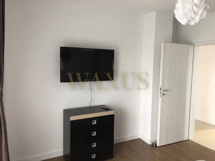 Apartament cu 2 camere semidecomandat, mobilat în Calea Moldovei