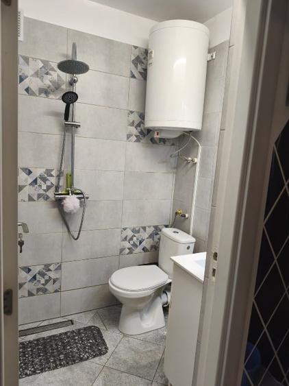 Apartament cu 2 camere semidecomandat, mobilat în Central