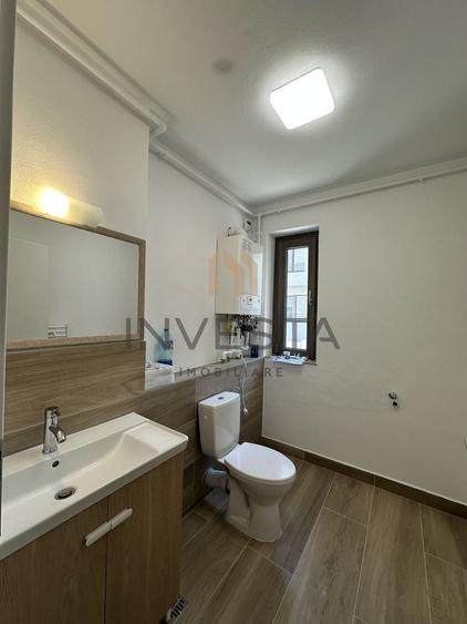 Apartament cu 3 camere semidecomandat, mobilat în Borhanci