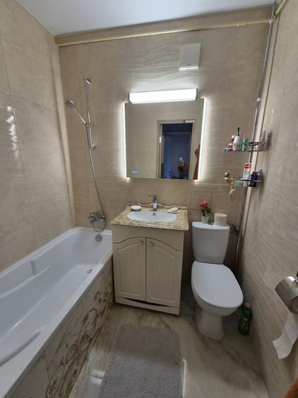 Apartament cu 3 camere decomandat în Ozana