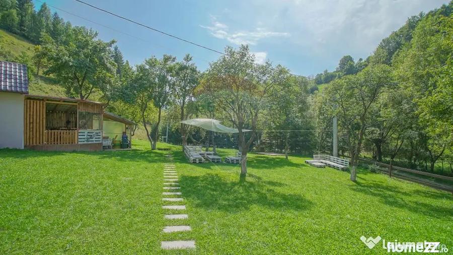 Casă cu 10 camere cu Teren 1137 Mp în Moieciu