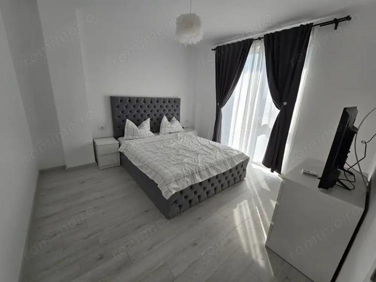 Apartament cu 2 camere semidecomandat, mobilat în Moșnița Nouă