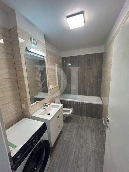 Apartament cu 3 camere semidecomandat, mobilat în Chinteni