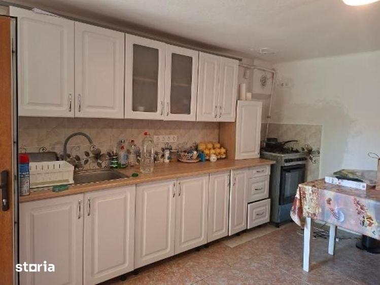 Casă cu 2 camere decomandat cu Teren 1150 Mp în Slimnic