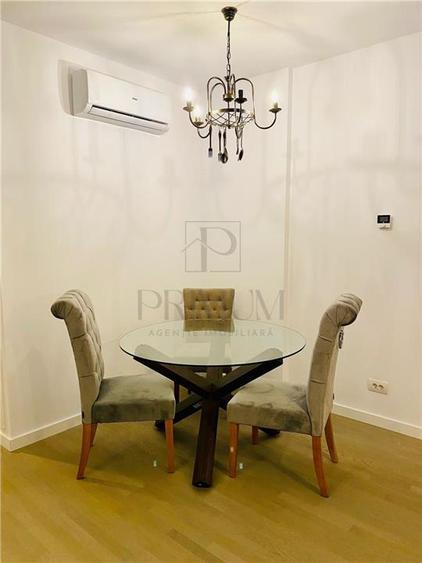 Apartament cu 2 camere semidecomandat, mobilat în Take Ionescu