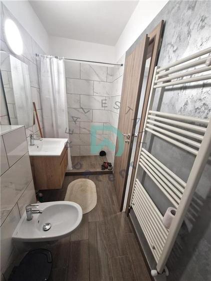 Apartament cu 2 camere decomandat în Tractorul