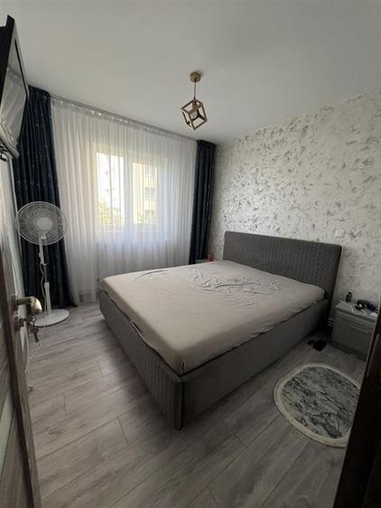 Apartament cu 2 camere semidecomandat, mobilat în Tractorul