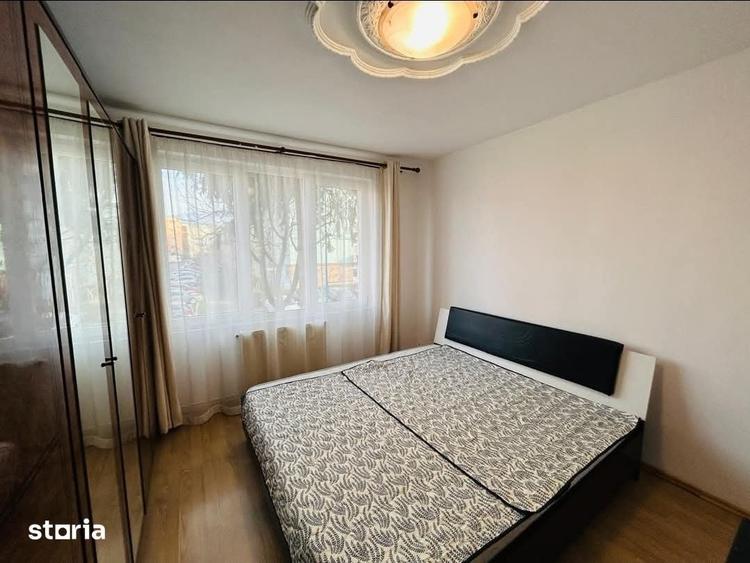 Apartament cu 3 camere decomandat în Tractorul