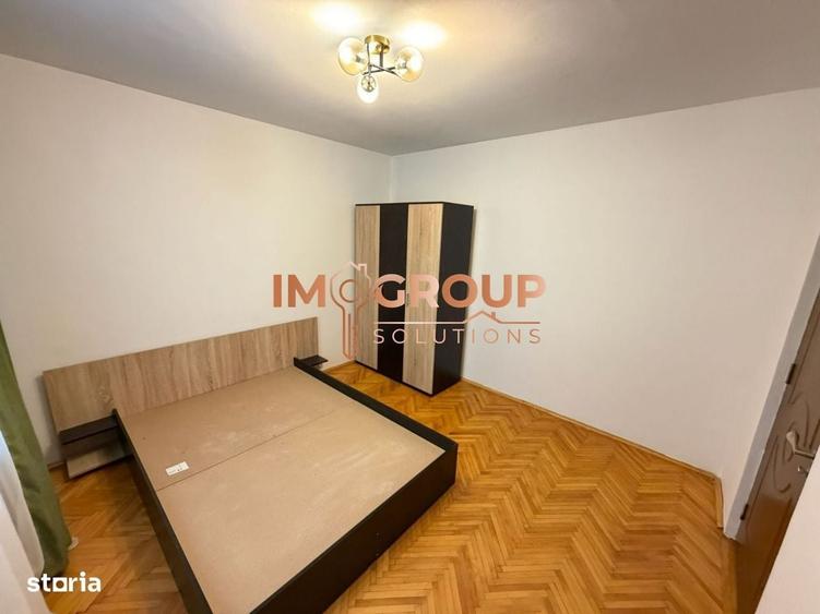 Apartament cu 3 camere semidecomandat în Podu Roș