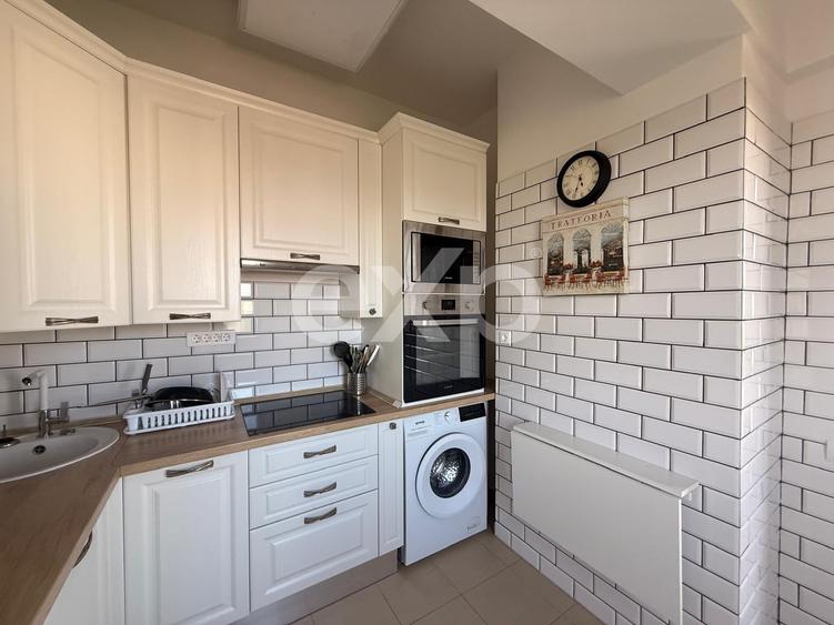 Apartament cu 2 camere semidecomandat, mobilat în Central