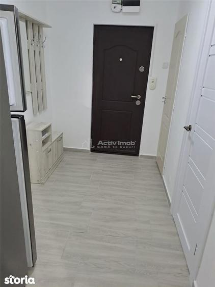 Apartament cu 3 camere semidecomandat, mobilat în Rahova