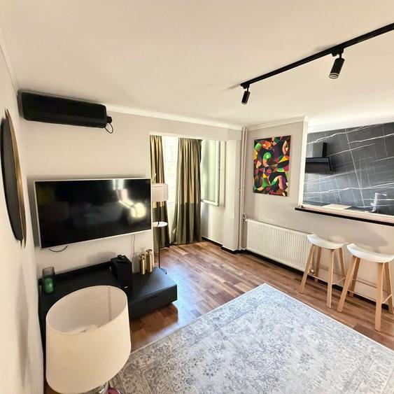 Apartament cu 2 camere semidecomandat, mobilat în Magheru