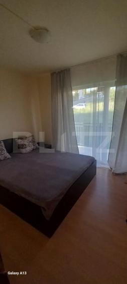 Apartament cu 2 camere semidecomandat, mobilat în Baciu