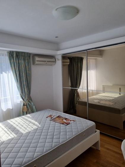 Apartament cu 3 camere decomandat în Polonă