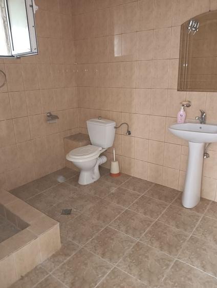 Casă cu 4 camere cu Teren 1000 Mp în Central