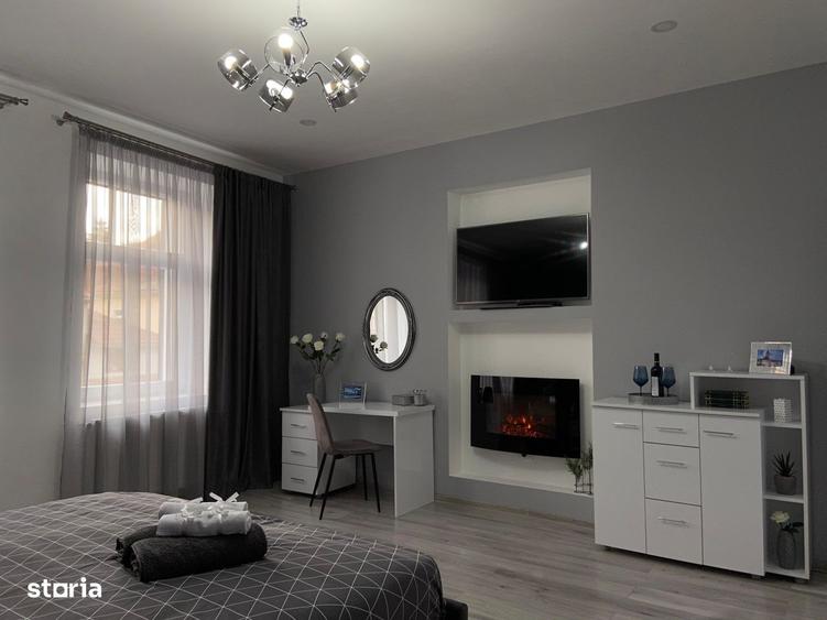 Apartament cu 2 camere, mobilat în Central