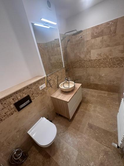 Apartament cu 2 camere semidecomandat, mobilat în Central