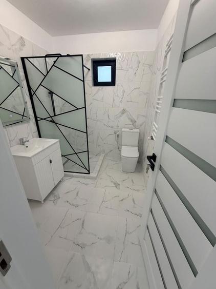 Casă cu 3 camere în Afumați