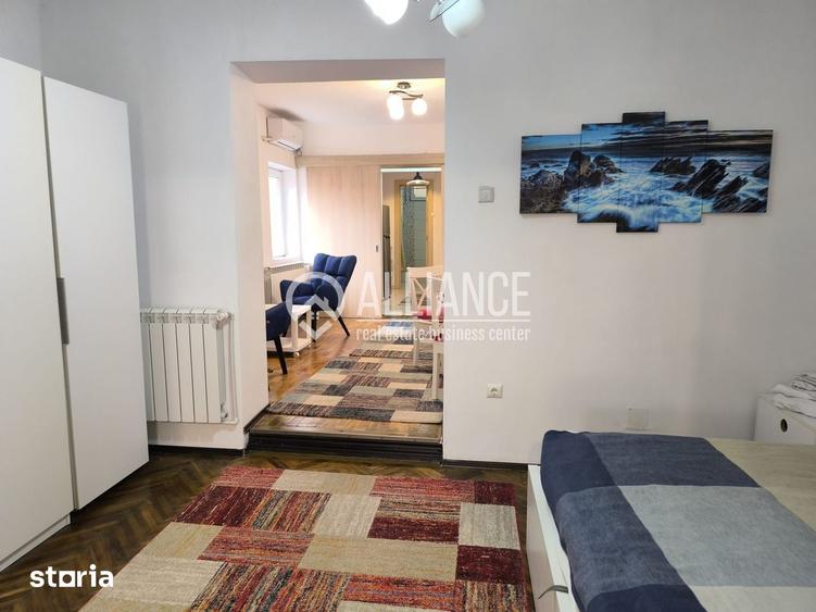 Apartament cu 3 camere semidecomandat, mobilat în Central