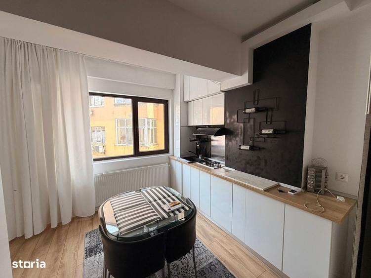 Apartament cu 2 camere semidecomandat, mobilat în P-ța Alba Iulia