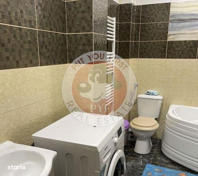 Apartament cu 3 camere semidecomandat în Rahova