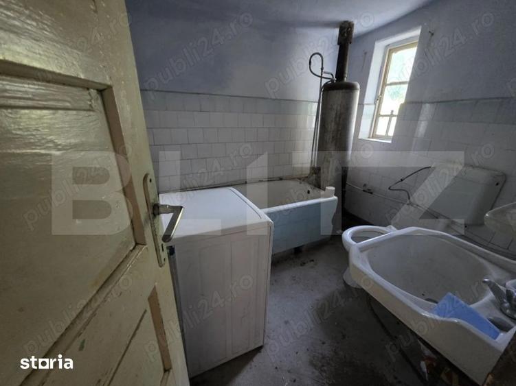 Casă cu 3 camere cu Teren 1820 Mp în Centură