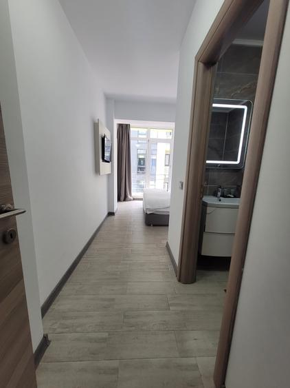 Apartament cu 3 camere semidecomandat, mobilat în Nord