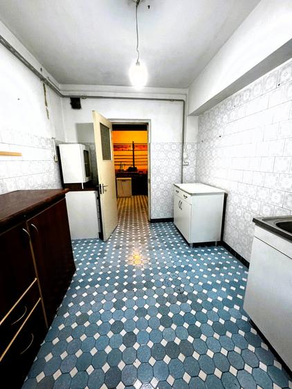 Apartament cu 3 camere decomandat în Podul de Fier