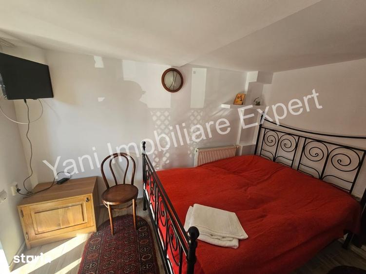 Casă cu 5 camere cu Teren 8000 Mp în Curtea de Argeș
