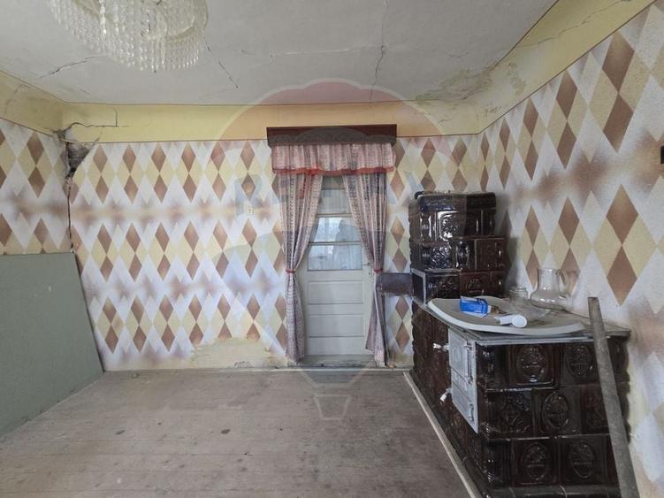 Casă individuală cu 3 camere cu Teren 1550 Mp în Ceanu Mic