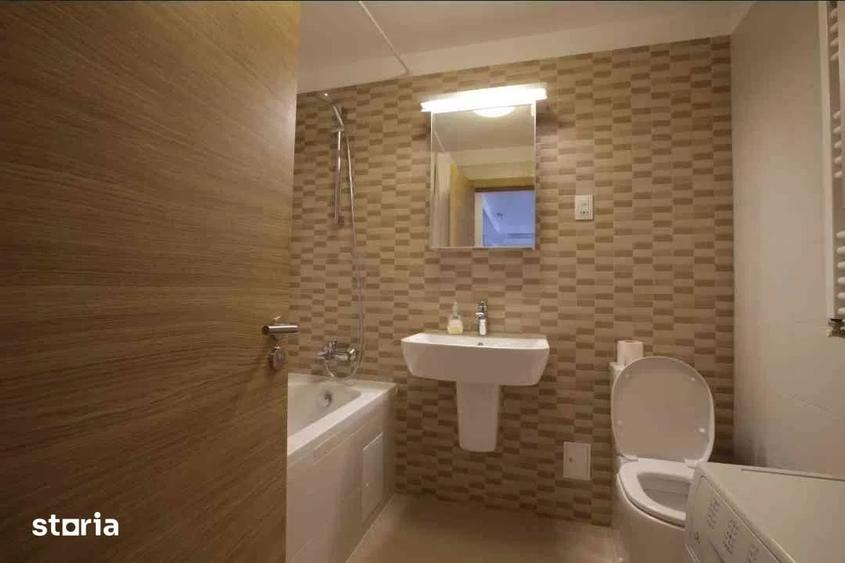 Apartament cu 2 camere semidecomandat, mobilat în Costin Georgian