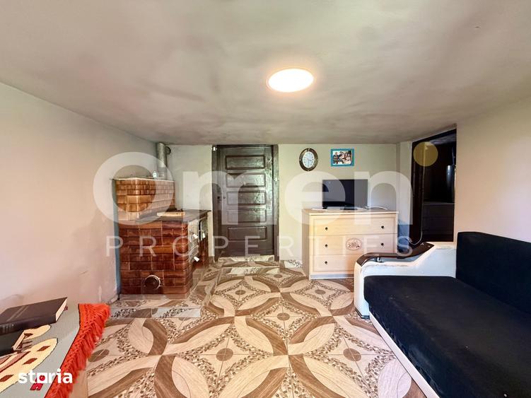 Casă cu 3 camere cu Teren 1129 Mp în Coroieni