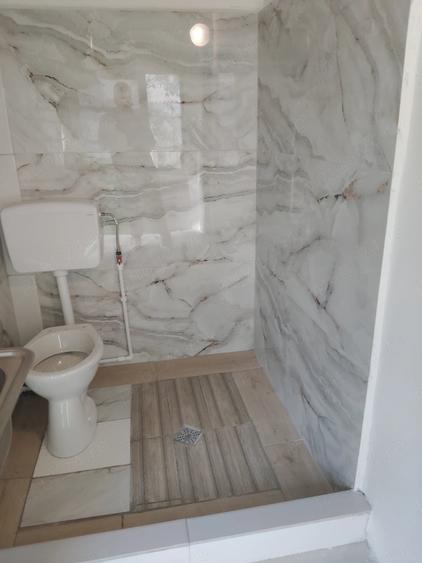 Casă cu 5 camere cu Teren 1000 Mp în Micro 14