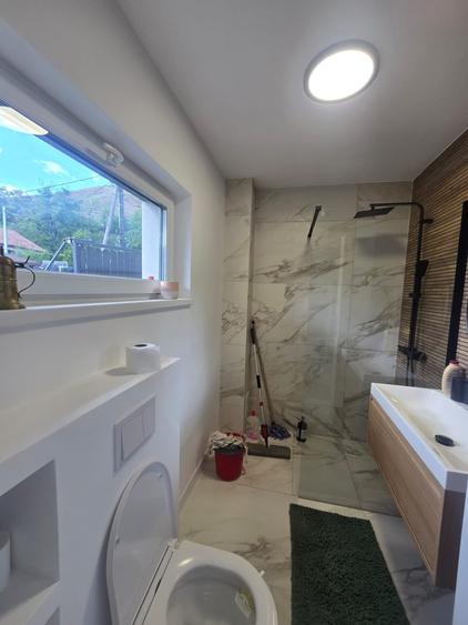 Casă individuală cu 4 camere cu Canalizare în Florești