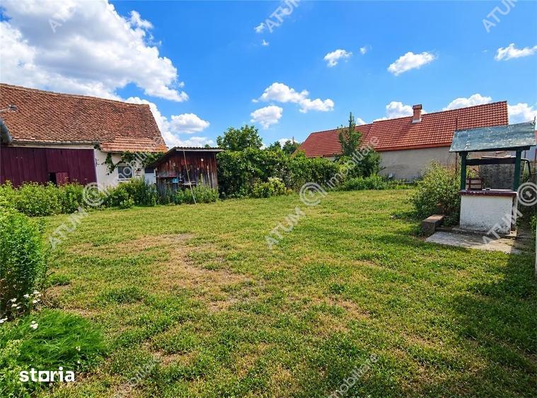 Casă cu 4 camere decomandat cu Teren 1650 Mp în Porumbacu de Jos