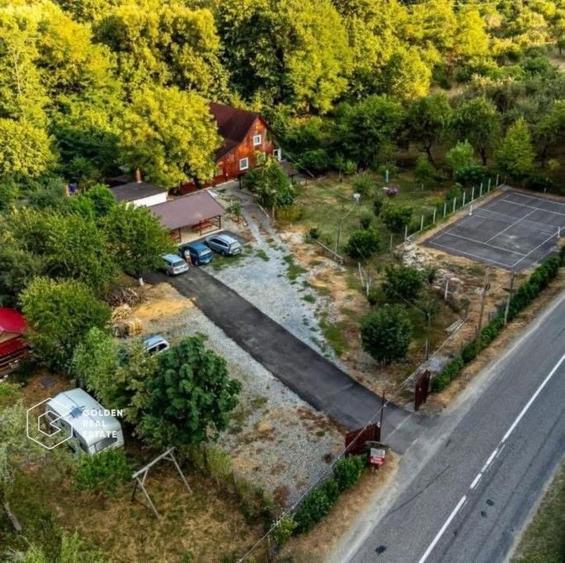 Casă individuală cu 6 camere cu Teren 2500 Mp în Căsoaia