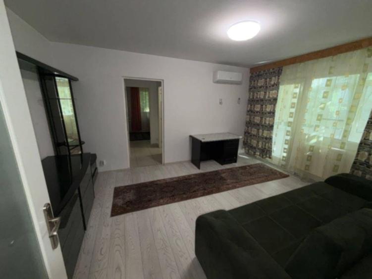 Apartament cu 2 camere semidecomandat în Podu Roș