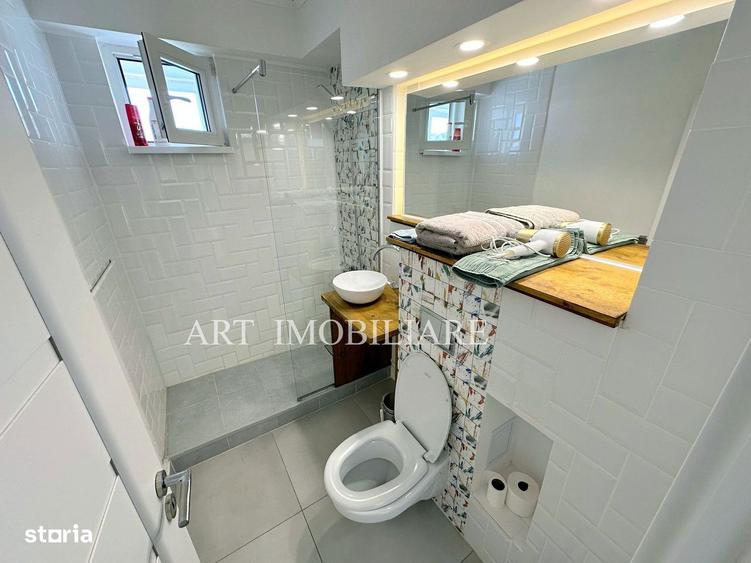 Apartament cu 2 camere semidecomandat, mobilat în Central