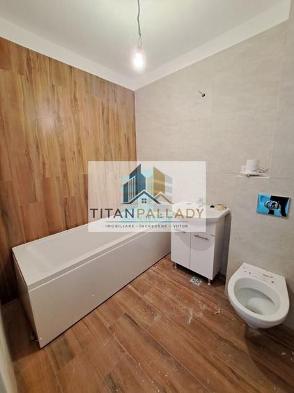 Apartament cu 4 camere decomandat în Titan