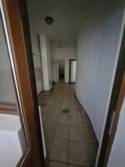 Casă cu 4 camere cu Teren 1000 Mp în Central