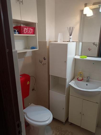 Apartament cu 3 camere decomandat în Coman