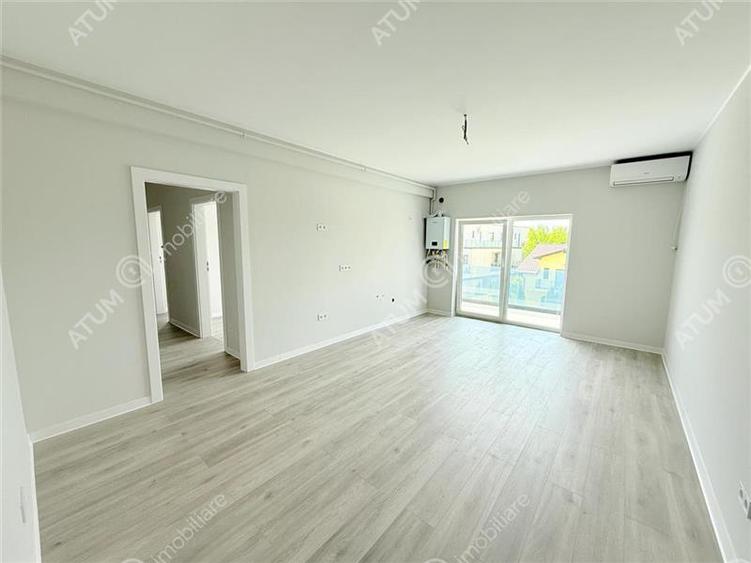 Apartament cu 3 camere decomandat în Șelimbăr — fotografia 3