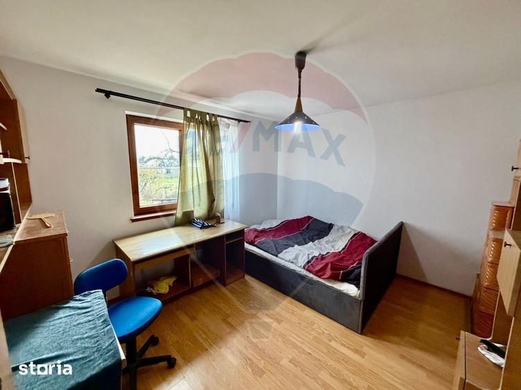 Casă cu 4 camere cu Teren 873 Mp în Vânători