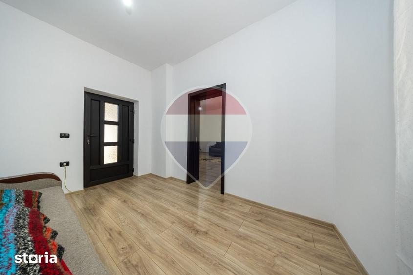 Casă cu 4 camere cu Teren 1346 Mp în Comana
