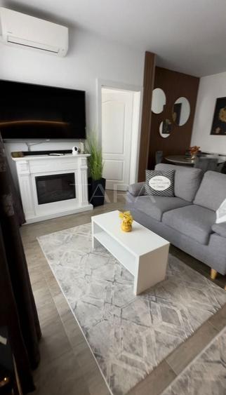 Apartament cu 3 camere semidecomandat, mobilat în Vest
