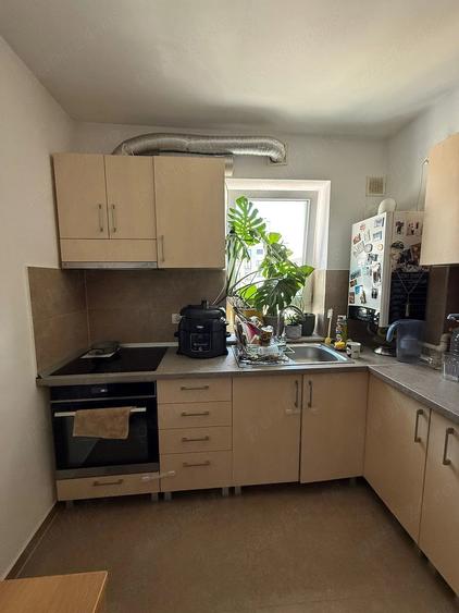 Apartament cu 2 camere decomandat în Tractorul