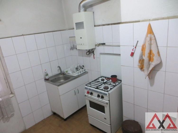 Casă individuală cu 3 camere cu Canalizare în P-ța Alba Iulia