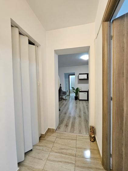 Apartament cu 2 camere semidecomandat, mobilat în Central