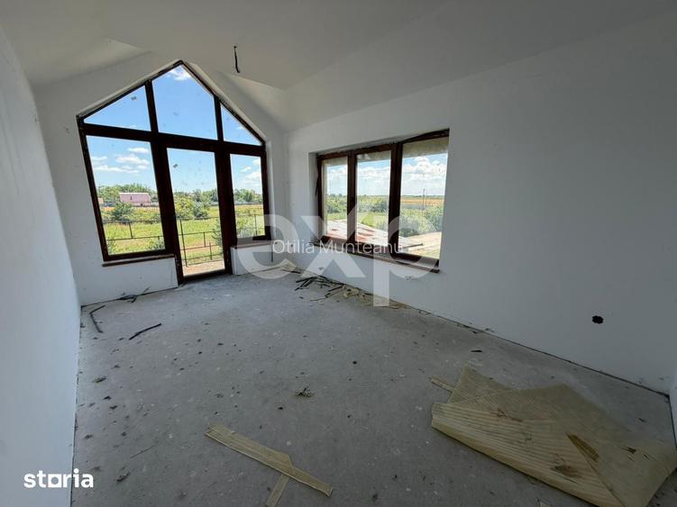 Casa spatioasa cu 5 dormitoare, Teren 1000mp, Butimanu -Ungureni