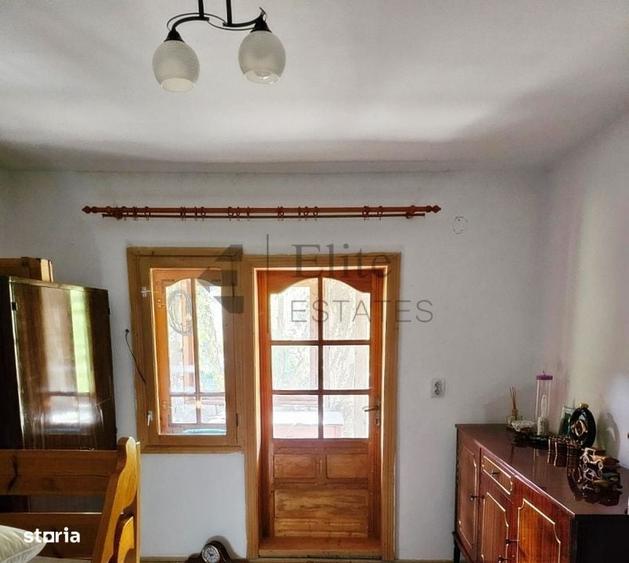 Casă cu 4 camere în Muncelu